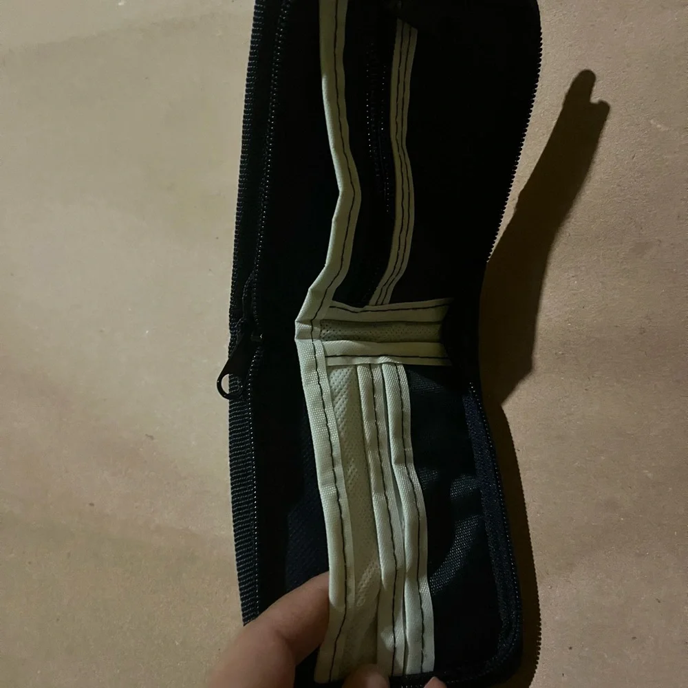 Pumas Black and Gold Wallet Zip up